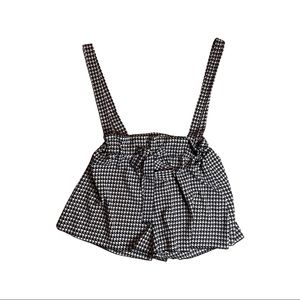 Houndstooth shorts with tie waist and attached suspenders. Large.